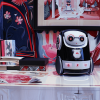 stylized_small_personal_assistant_robot_on_desk